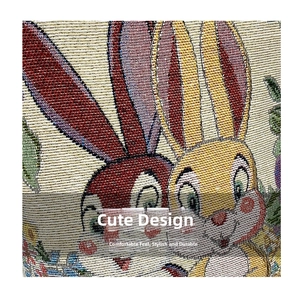 Close-up of vibrant jacquard embroidery showing colorful cartoon rabbit patterns on fabric