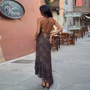Sexy backless leopard print maxi dress with ruffle details and criss-cross straps
