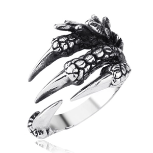 Detailed close-up of retro silver dragon claw ring showing scale texture and open band