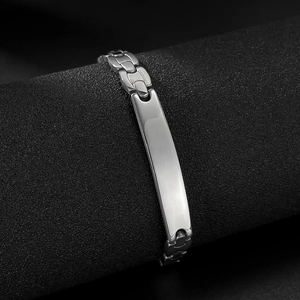 Polished stainless steel hip hop chain bracelet with a curved bar on a black background