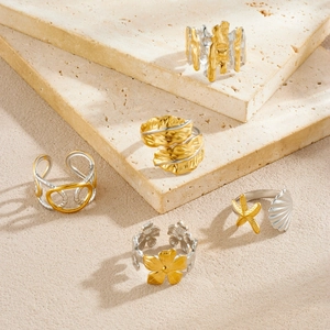 Bicolor stainless steel open rings featuring nature leaf flower and seashell motifs