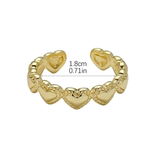 Adjustable copper alloy open ring featuring textured golden heart motifs for women