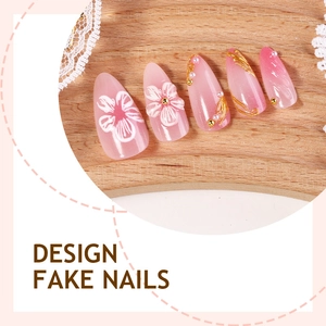 3D floral pink gradient almond press-on nails with gold accents and pearl decorations