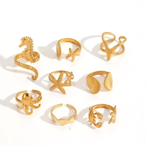 Golden ocean theme rings set featuring seahorse, starfish, and shell designs for women