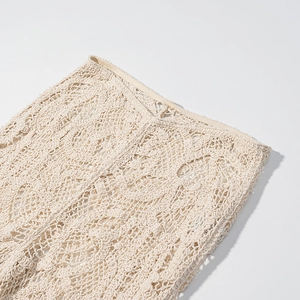 Winterse gehaakte flared broek met hoge taille en opengewerkte details warm beige