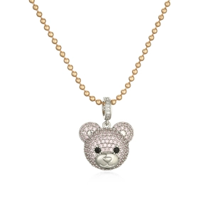 Close-up of pink zircon bear head pendant with rose gold beaded chain on white background