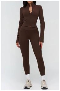 Women's dark brown yoga set featuring a stand collar zipper top and high waist side pocket leggings