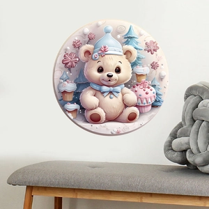 Close-up of a round cartoon bear wall sticker with macaron tones and cupcake elements
