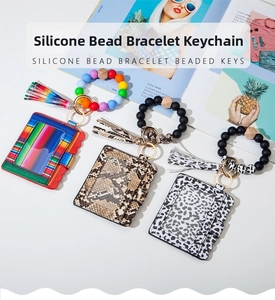 Detailed view of silicone bead bracelet keychain set with leopard and snake print card holders