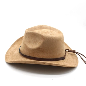 Detail of khaki faux suede cowboy hat featuring brown leather band and blue bead accents
