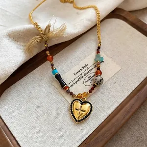 Vintage brown tiger eye heart pendant necklace with floral bow and colorful beads