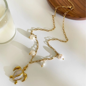 Golden turtle pendant necklace with freshwater pearls and paperclip chain links