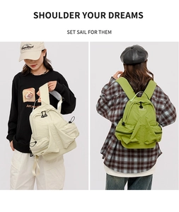 Front and back view of cream and green space series nylon backpacks for women