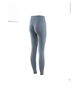 Detail showing scrunched seam for butt-lifting effect on gray yoga leggings