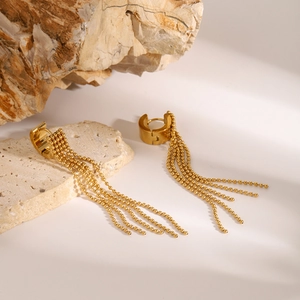 Elegant gold stainless steel tassel earrings with beaded chains on natural stone