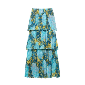 Women's summer floral tiered maxi dress with blue and yellow flower prints in a boho style