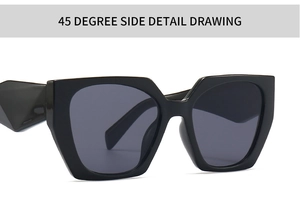 Close-up of black oversized sunglasses showing geometric temple design and 45-degree angle