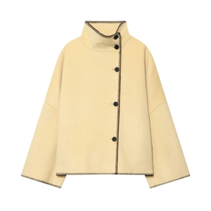 Women's light yellow high-neck wool jacket with black blanket stitch and button details
