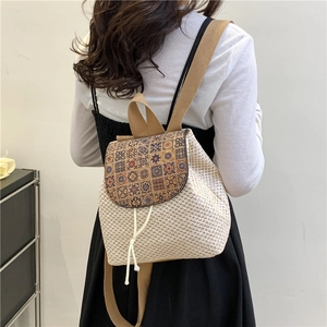 Women's summer straw bucket backpack with fringe and geometric print flap cover