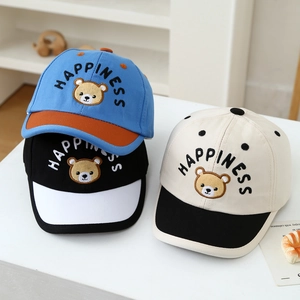Kids baseball cap with happiness bear embroidery in blue, black, and beige colors