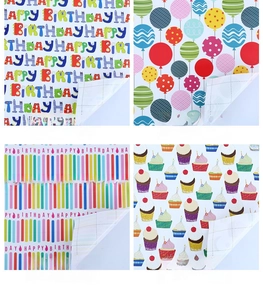 Detail view of four birthday gift wrap patterns featuring balloons and cupcakes