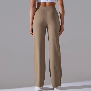 Rear view of high-waisted khaki wide-leg yoga pants showing back seam and flowing fabric