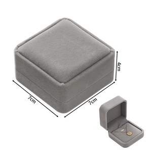 Detailed view of gray velvet jewelry box 7x7x4cm with soft texture and inner lining