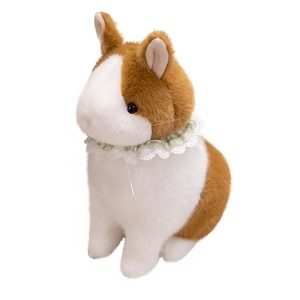Cute brown and white plush rabbit keychain with a green lace collar on white background