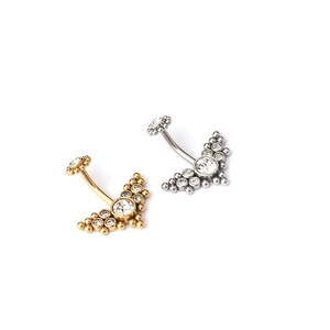 Polished stainless steel belly rings with clear cubic zirconia in gold and silver finish