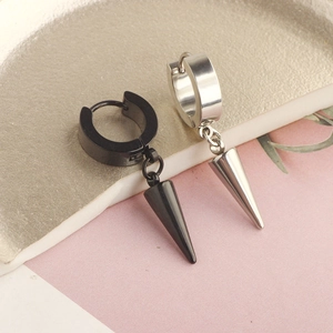 Close-up of black and silver stainless steel cone hoop earrings in punk style
