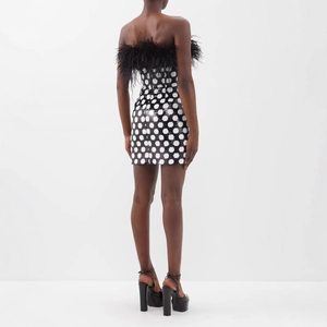 Polka dot bodycon mini dress with black ostrich feather trim and open back design