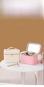 Detail view of large makeup bag with integrated LED mirror and spacious inner storage