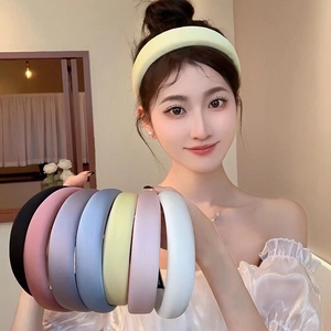 Padded sponge headband with satin finish in multiple colors for high hair crown look