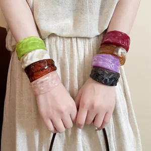 Chic wrinkled acrylic resin cuff bracelet in various colors for a vintage minimalist look