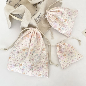 Three sizes of floral cartoon drawstring storage bags with cute bear patterns