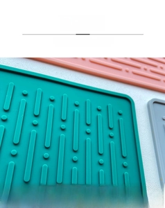 Macro detail of anti-slip silicone drain mat with deep grooves for efficient water drainage