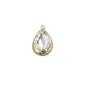 Macro detail of a teardrop crystal charm in a gold frame for DIY jewelry making
