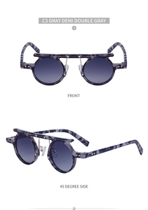 Close-up of gray demi round sunglasses with double bridge and star metal accents
