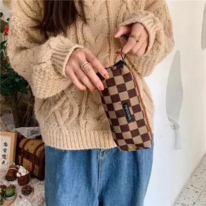 Retro brown checkerboard corduroy pencil case with gold zipper and metal ring puller