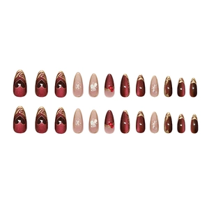 24-piece almond press-on nails with dark red cat-eye effect and golden pearl accents