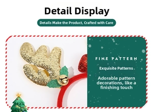 Detail of Christmas reindeer antler headband featuring gold sequins and festive bells