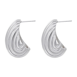 Detailed view of silver irregular wave earrings with French style geometric design