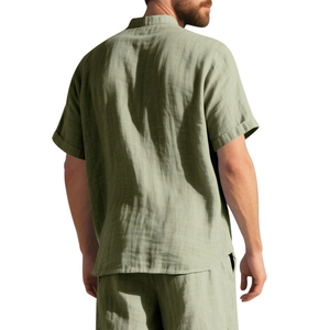 Rear view of men's casual linen blend shirt and shorts set in sage green fabric
