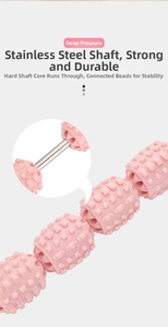 Detail of pink muscle roller showing durable stainless steel inner core for deep pressure