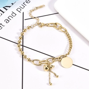 Bracciale in acciaio al titanio dorato con ciondolo a zucca, catena multipla e nappa