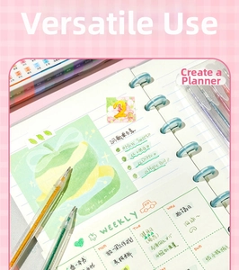 Detail of transparent blue binder notebook with weekly plan and glitter gel pens