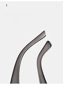 Detail of dark gray curved sunglasses temples with ergonomic design for comfortable wear