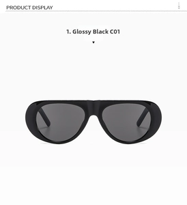 Close-up of bright black oversized shield sunglasses with dark tinted lenses model C01
