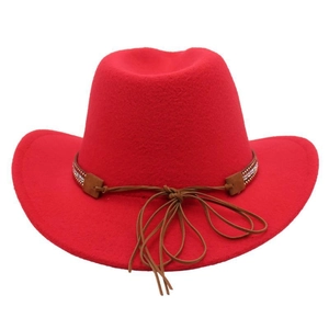 Detail of red wool felt cowboy hat featuring brown braided cord and rhinestone accents