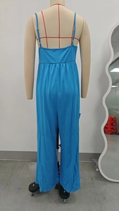 Back view of blue sleeveless wide leg jumpsuit with strap detail on a tailoring mannequin